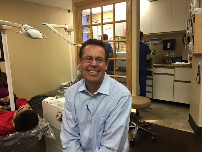 Dr. Ketcherside smiling in the Corona office