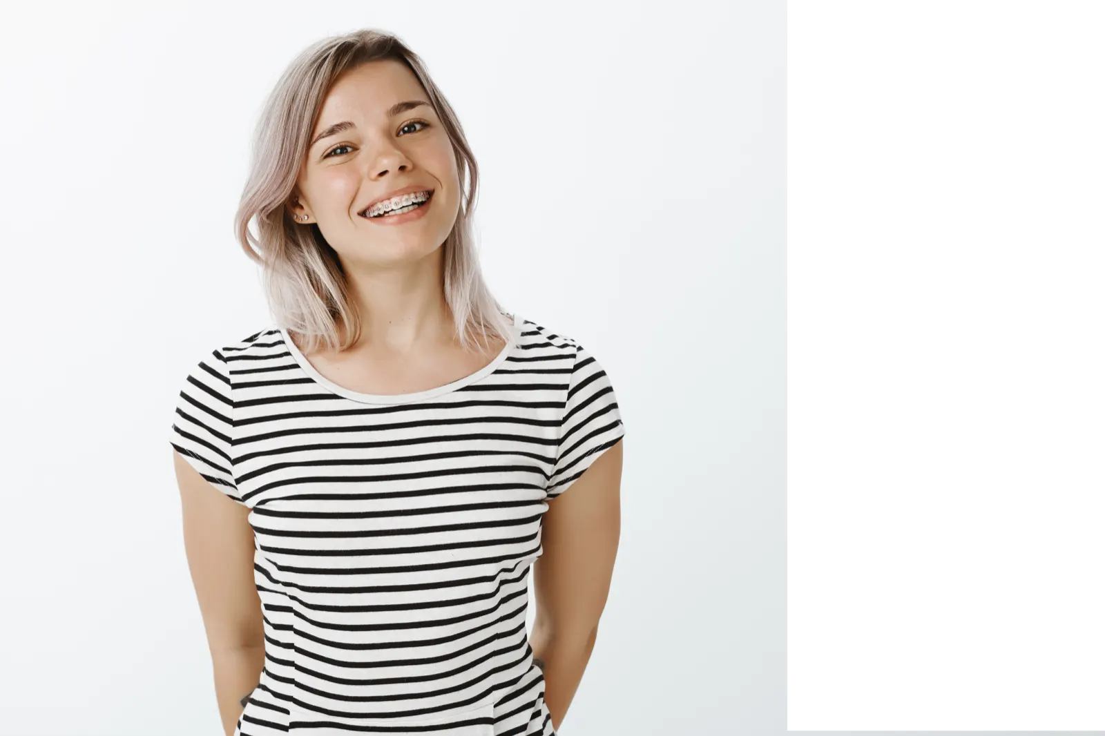 Teen girl smiling with braces at The Brace Connection in Corona